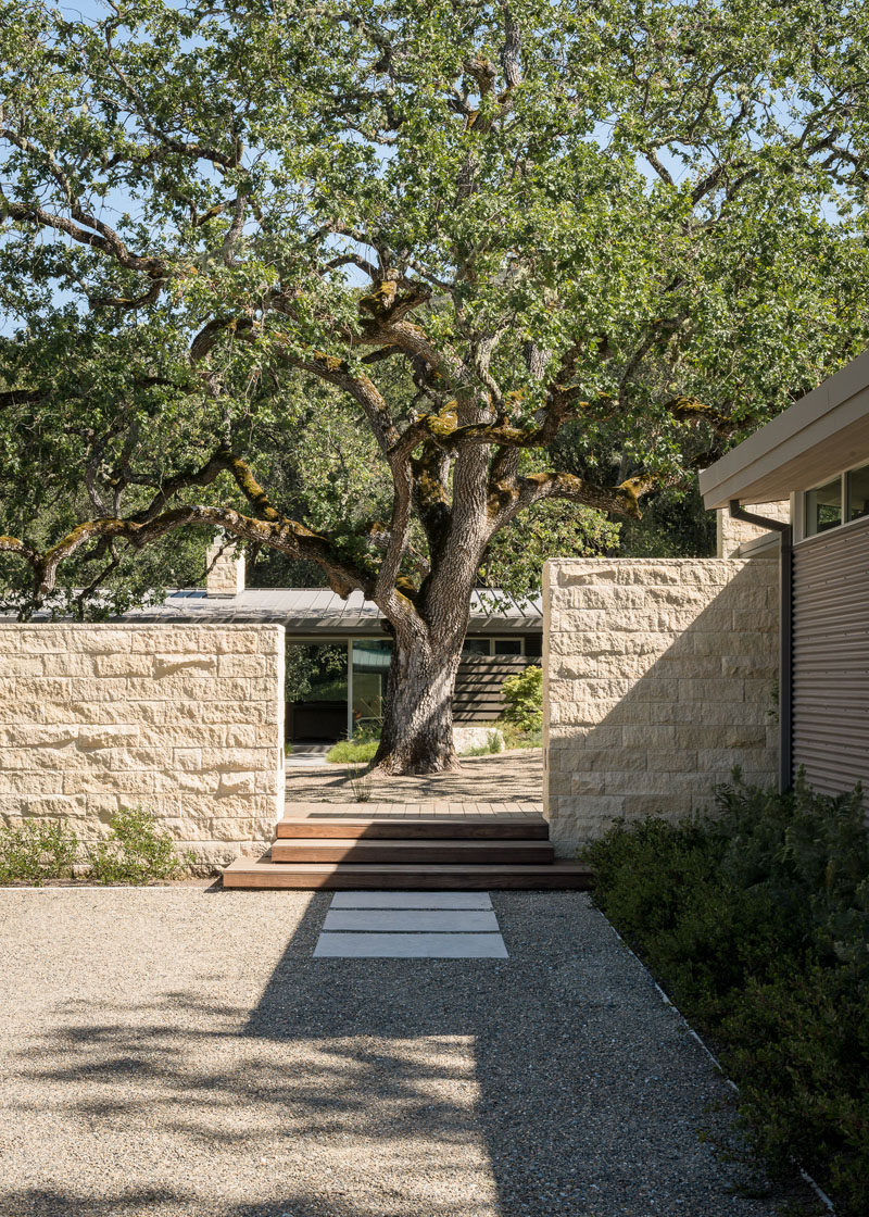 This weekend retreat, designed by Feldman Architecture, features pre-weathered corrugated steel cladding and buff limestone walls, and is located atop a ridge in the Santa Lucia mountains of Carmel, California.