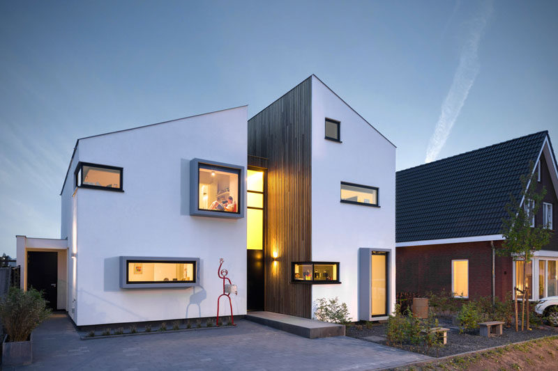 This Modern House Has A Window Seat With A View Of The Neighborhood