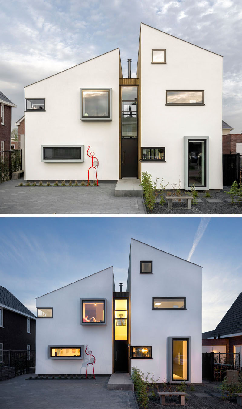 This home, located in Roosendaal in The Netherlands, has been designed as a deconstruction of a traditional Dutch house silhouette, with several floors for living and a few interesting features like a protruding window seat and a hanging fireplace.