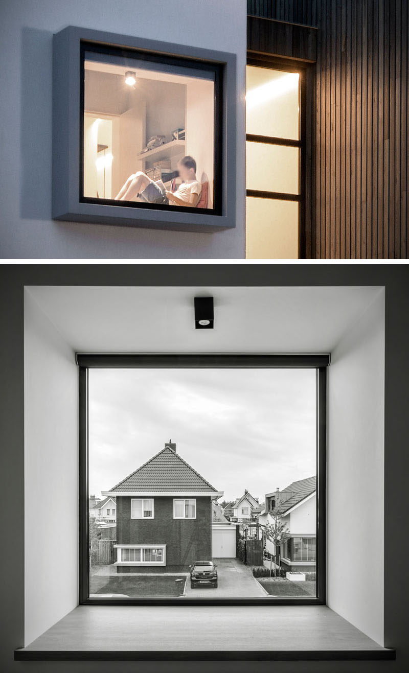 This home has a window that protrudes out from the house, making it large enough to have a deep window seat for someone to sit in.