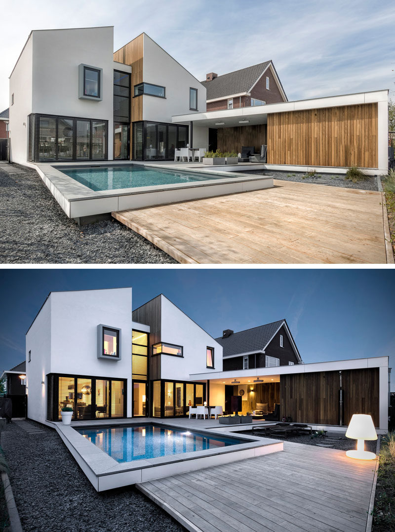 The back of this house has a swimming pool and a partly covered sun terrace. At night, you can really see how the backyard is lit up, perfect for nighttime entertaining.