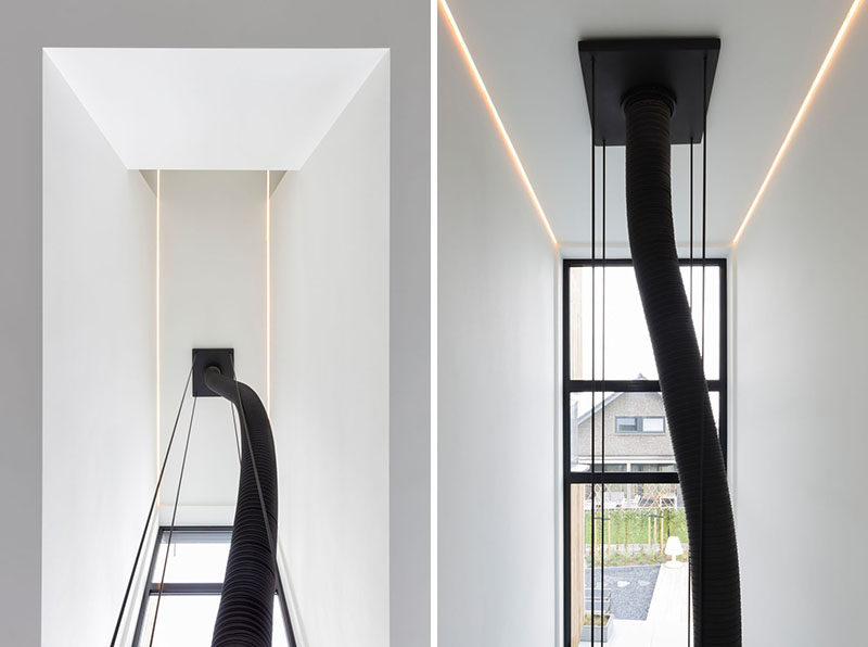 These photos show how a hanging fireplace can be connected and vented to the ceiling above.