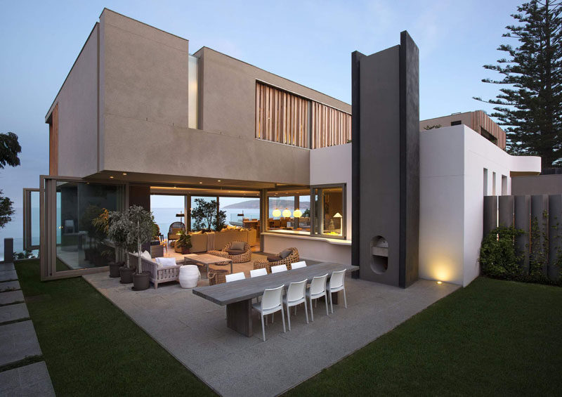 This family home in South Africa has an outdoor dining and living area, as well as a built-in wood burning oven.