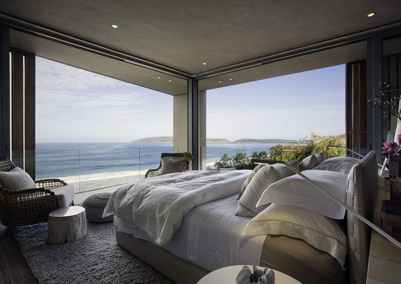 This bedroom has amazing, uninterrupted water views, with glass doors that slide open.