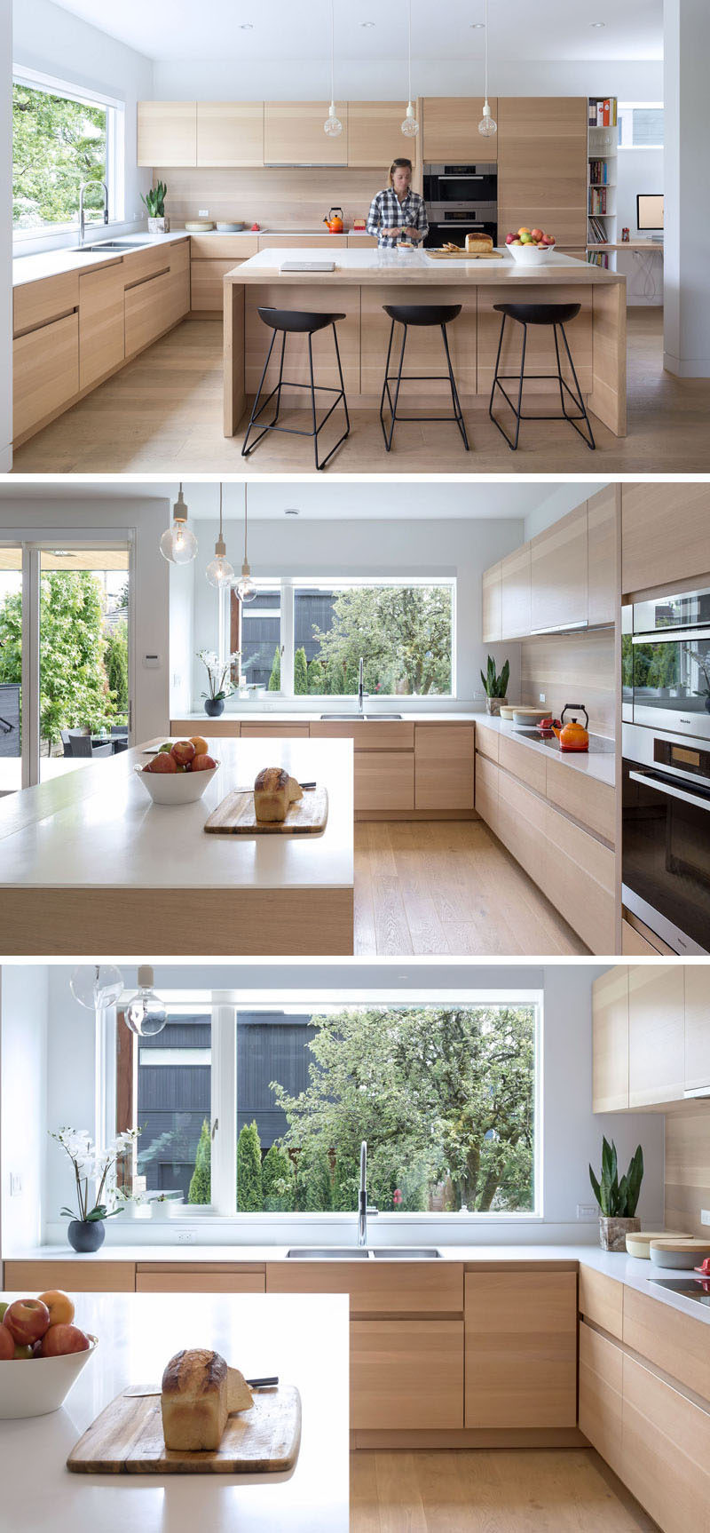 In this kitchen, a large window provides lots of natural light to the mostly wooden kitchen. Exposed shelves are used to store recipe books, and the kitchen has achieved a contemporary look by not including hardware on the cabinets. 