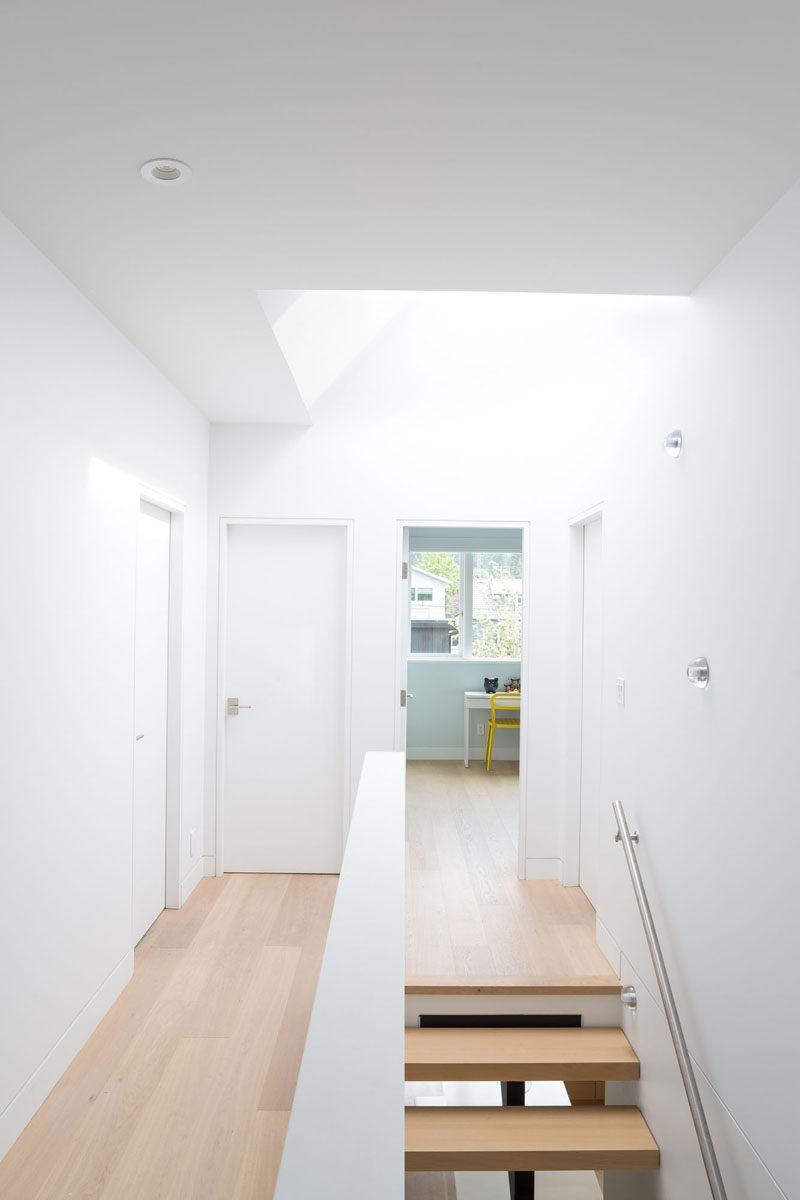 White walls and white oak floors provide a contemporary look in this home.