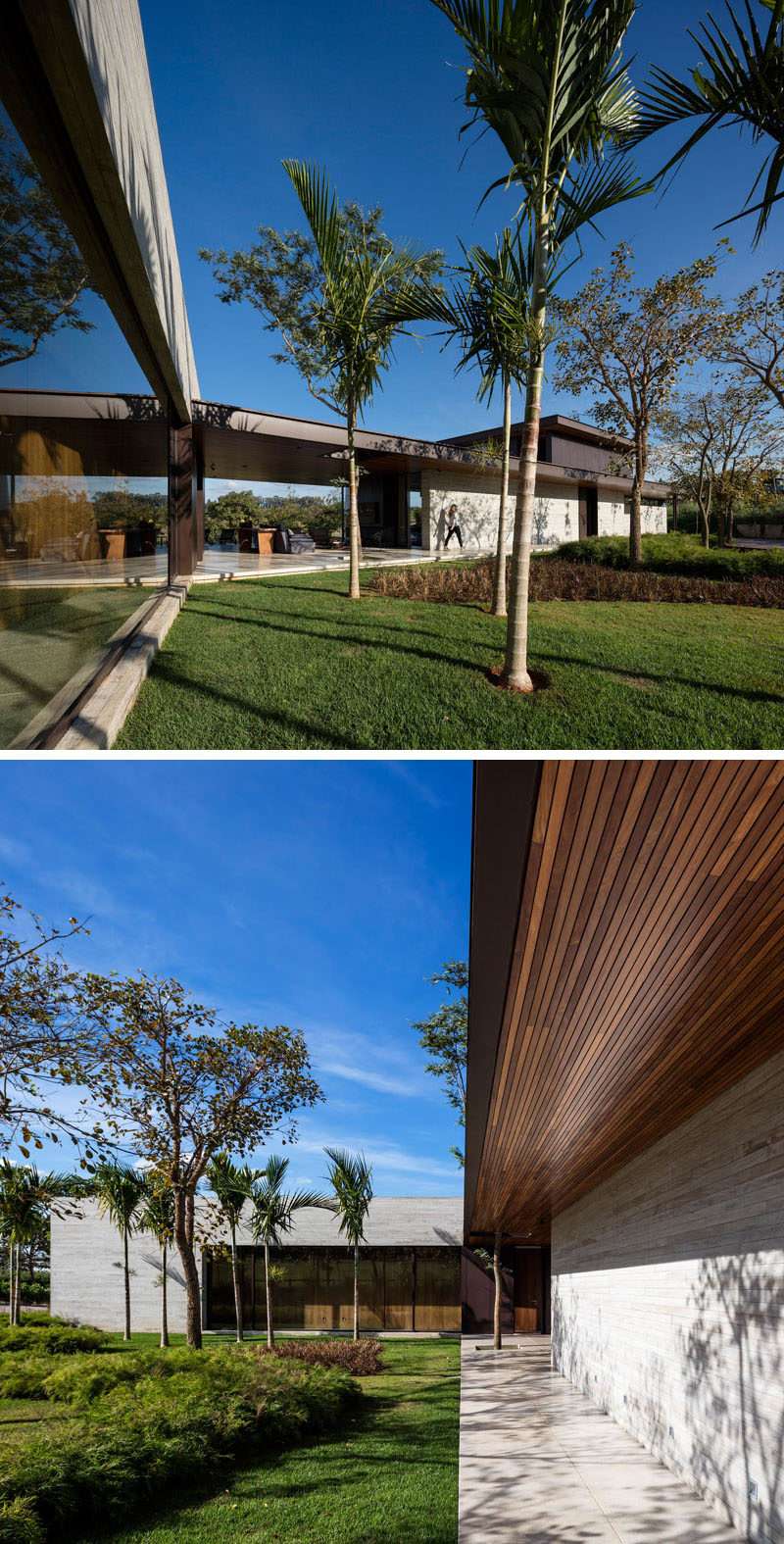 This home in Brazil has a covered walkway on the exterior of the home.