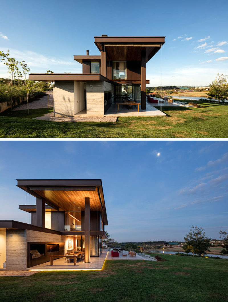 At night, the stone covered outdoor areas of this home are outlined with hidden lighting.