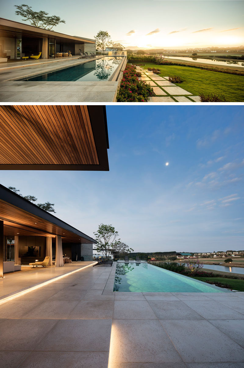 The swimming pool is stepped down slightly from this house, and lighting is hidden within the step, creating a nice atmosphere at night.