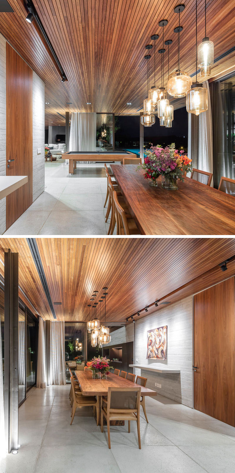 Multiple pendant lights define this dining area, and a simple floating sideboard rests under a highlighted piece of art.