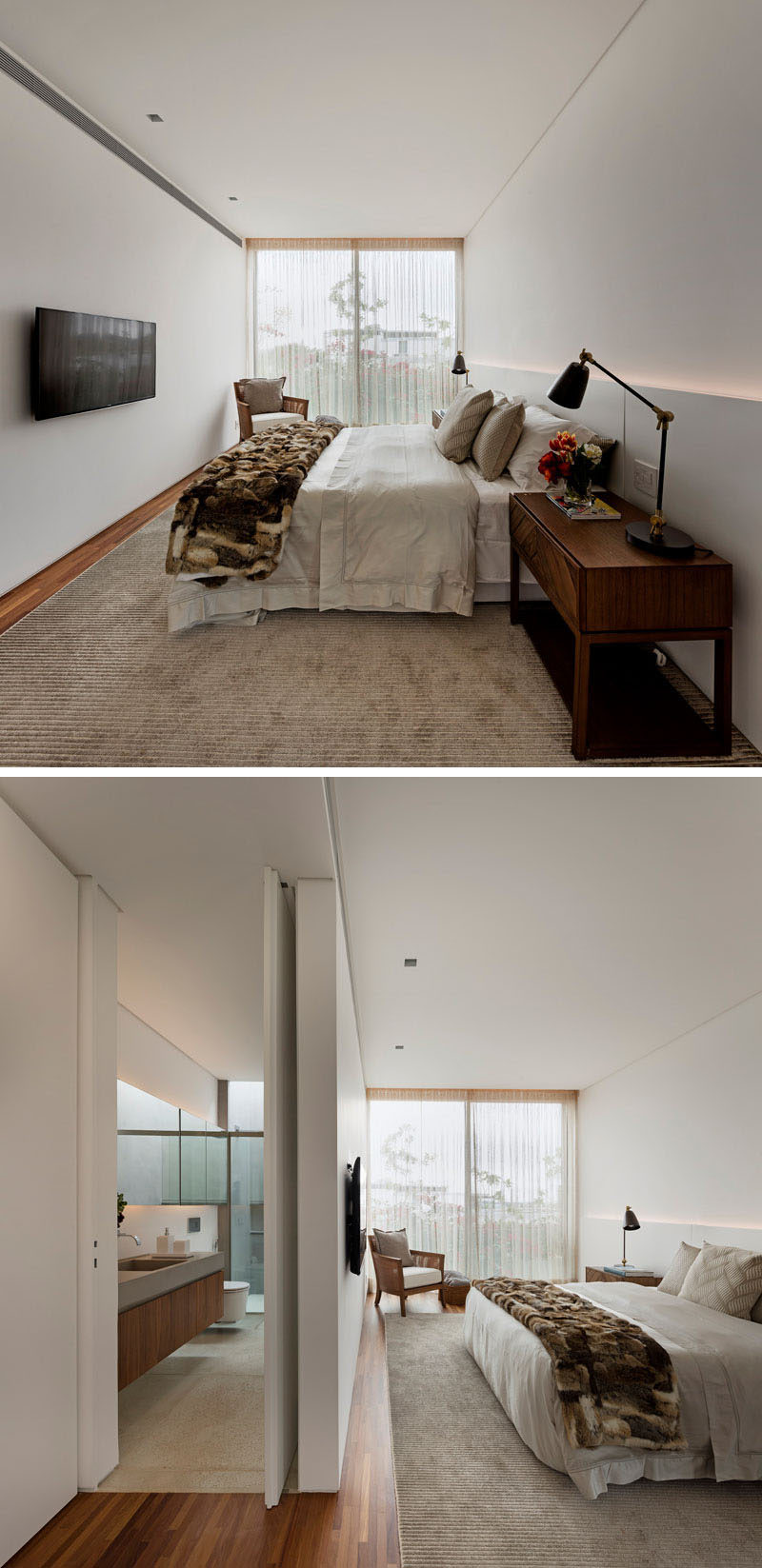 This bedroom has soft lighting hidden behind the custom-built headboard that runs the length of the room.