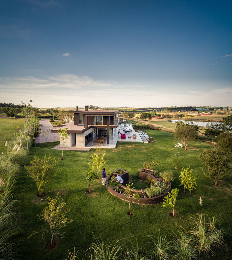 This Brazilian house has a circular vegetable garden in the backyard.