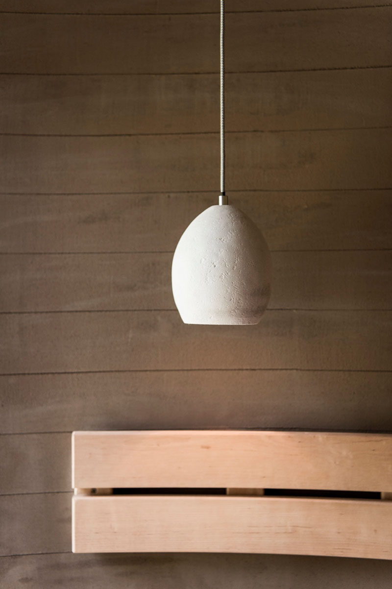 Contemporary lighting features in this sauna in Italy.