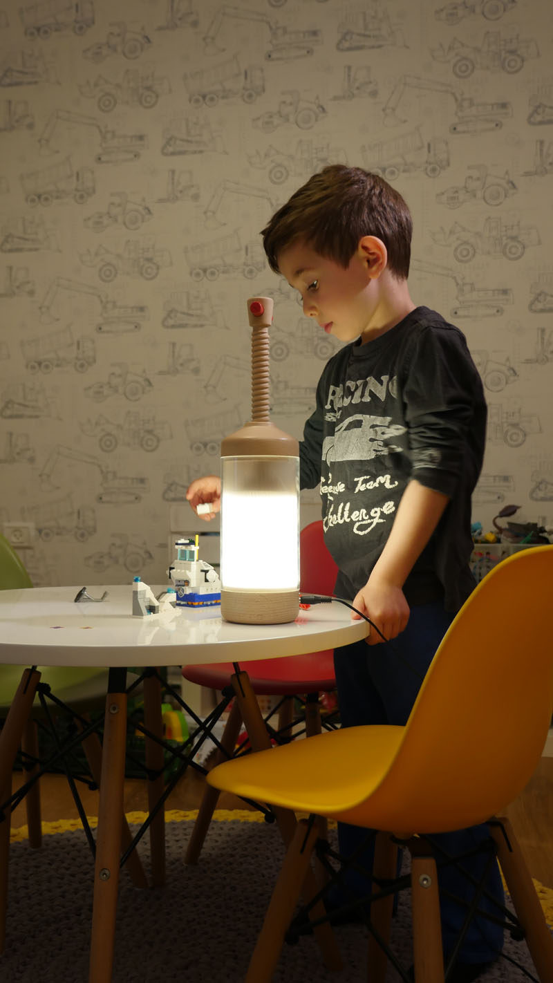 London-based duo Omer & Ortal Menashri, have designed a lamp that allows you to adjust the amount of light it shows by quickly pushing the light down, or by using the screw mechanism, depending on the design.