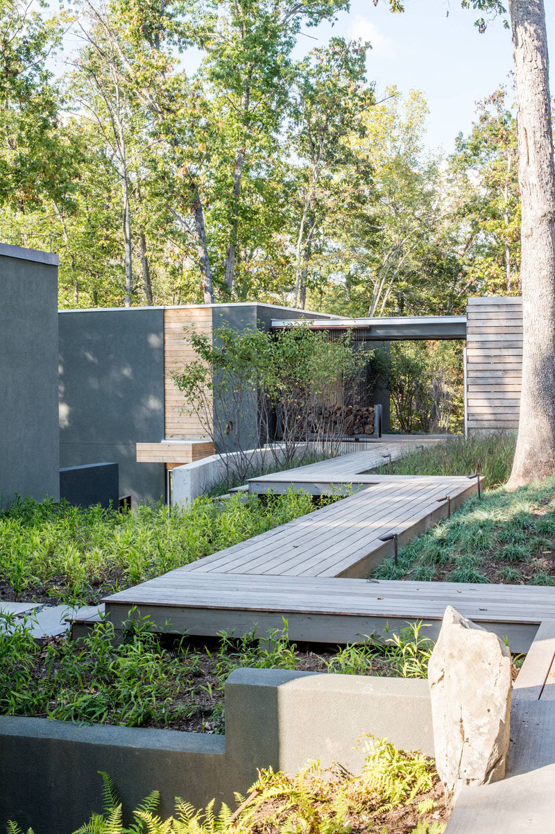 7 Landscaping Ideas For Your Front Yard // Include a bridge --- If you have multiple levels or a garden lower than the sidewalk, consider adding a bridge to create a unique entry way and keep people off your precious plants.