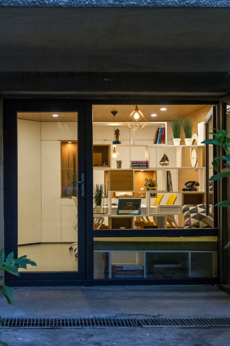 An old garage was converted into this small 236 square foot office for an architecture firm.