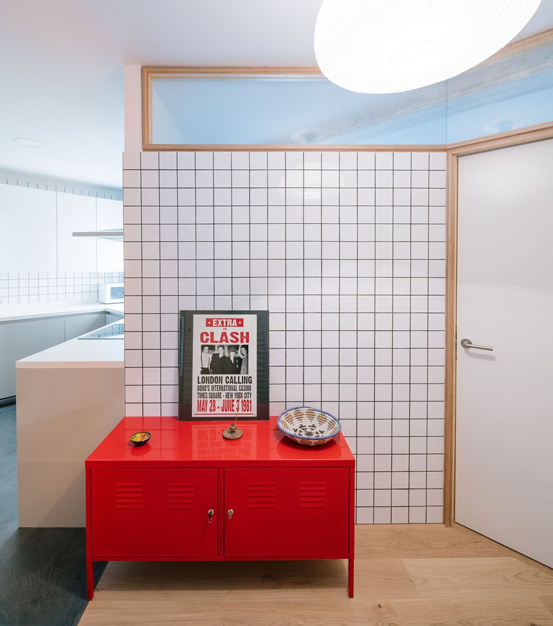 Colored Grout Breaks Up The White Tile Used Throughout This Interior