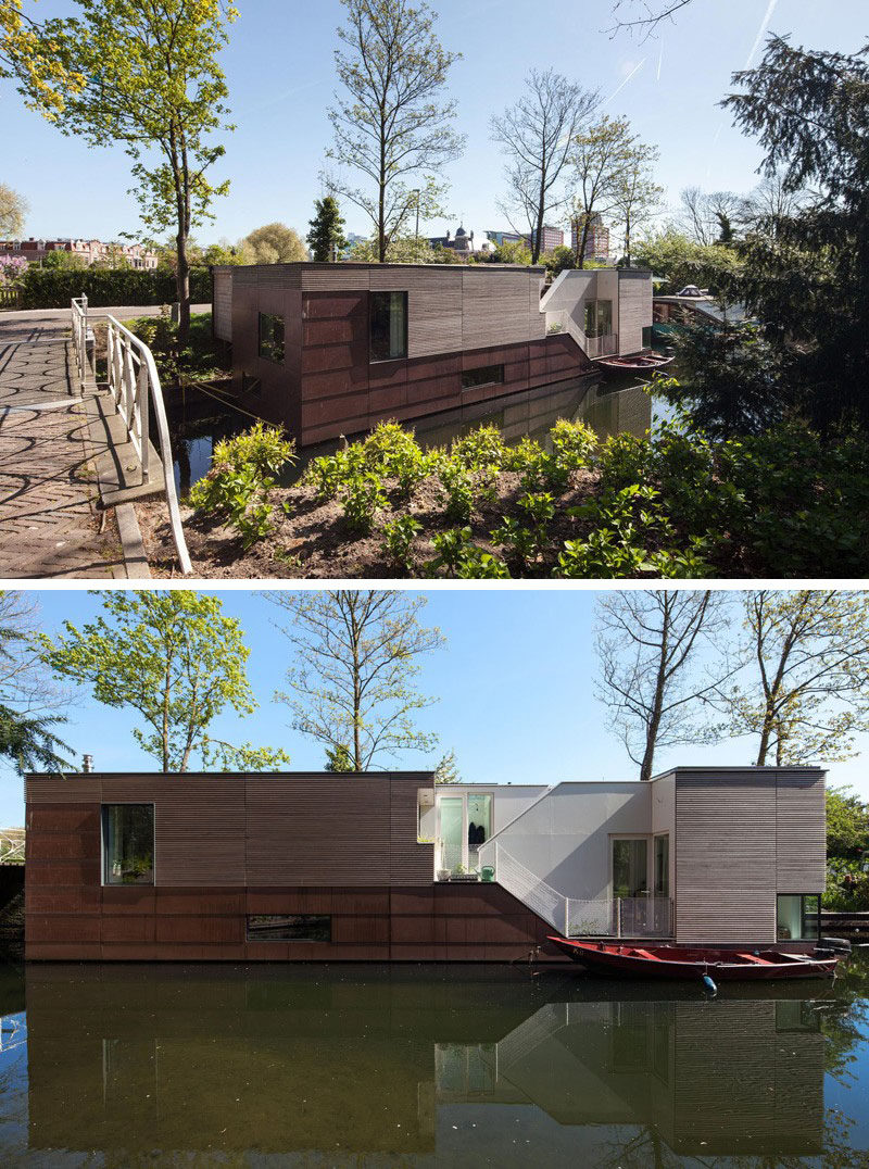 11 Awesome Examples Of Modern House Boats // This multi-level houseboat floats on a canal in The Netherlands and has both privacy and beautiful views of the canal.