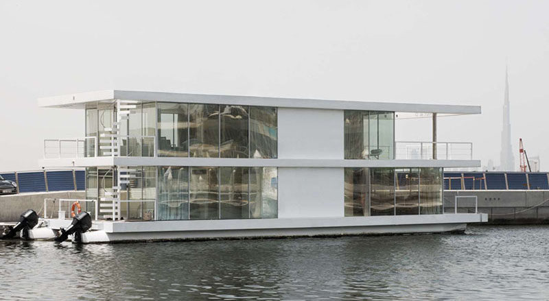 11 Awesome Examples Of Modern House Boats // This houseboat is made primarily from glass and stainless steel to make it more visually intriguing as it floats through the water.