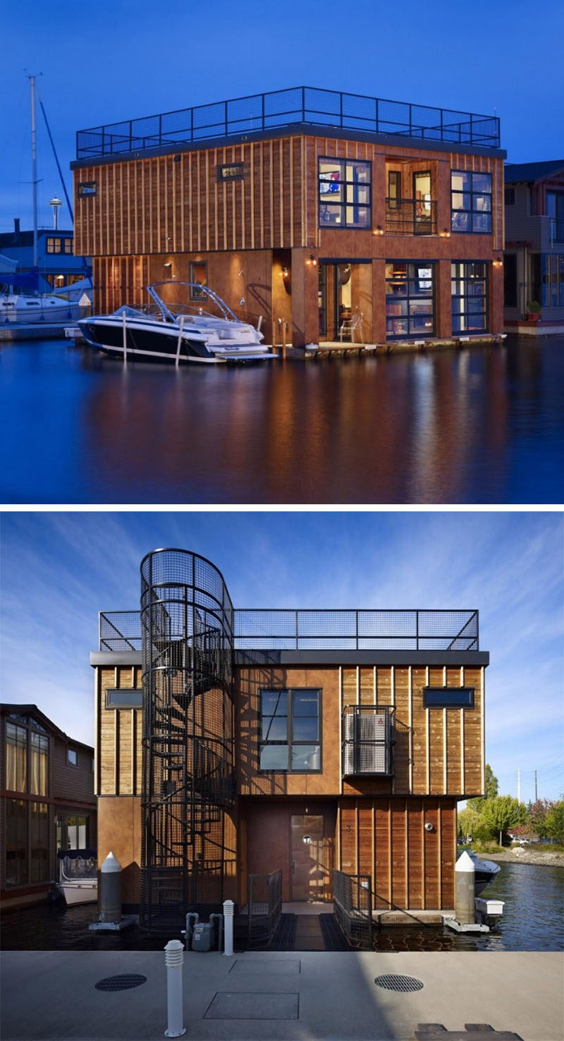 11 Awesome Examples Of Modern House Boats // This two-storey houseboat has a roof deck that's accessible from a ground floor spiral staircase.