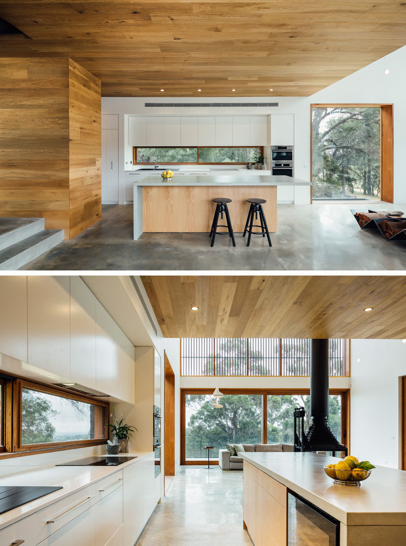 12 Inspirational Examples Of Letterbox Windows In Kitchens // This wood framed letterbox window doubles as a backsplash and creates a nice contrast with the white cabinetry and countertops.