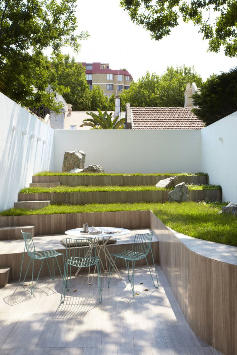 13 Multi-Level Backyards To Get You Inspired For A Summer Backyard Makeover // It may be a small yard but the various levels allow for more green space and make it appear larger.