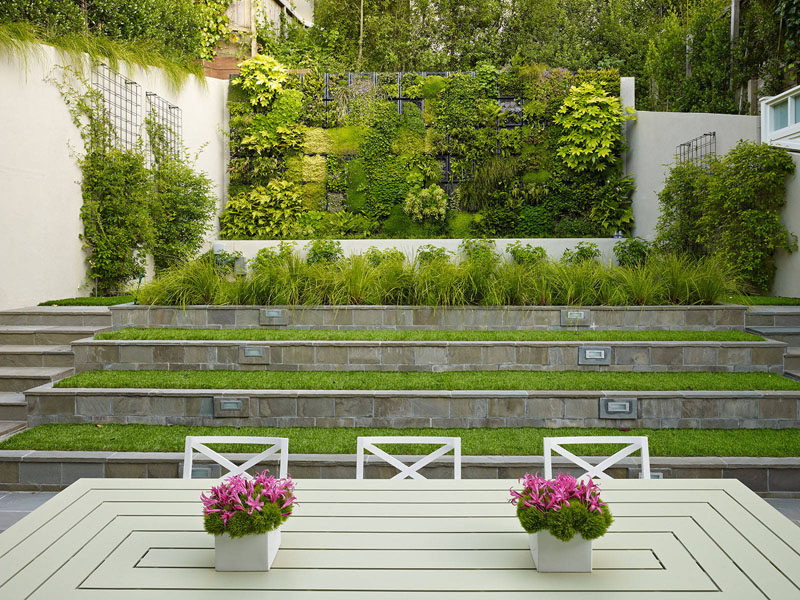 13 Multi-Level Backyards To Get You Inspired For A Summer Backyard Makeover // ots of green in the various levels of this backyard help it feel bigger than it actually is.