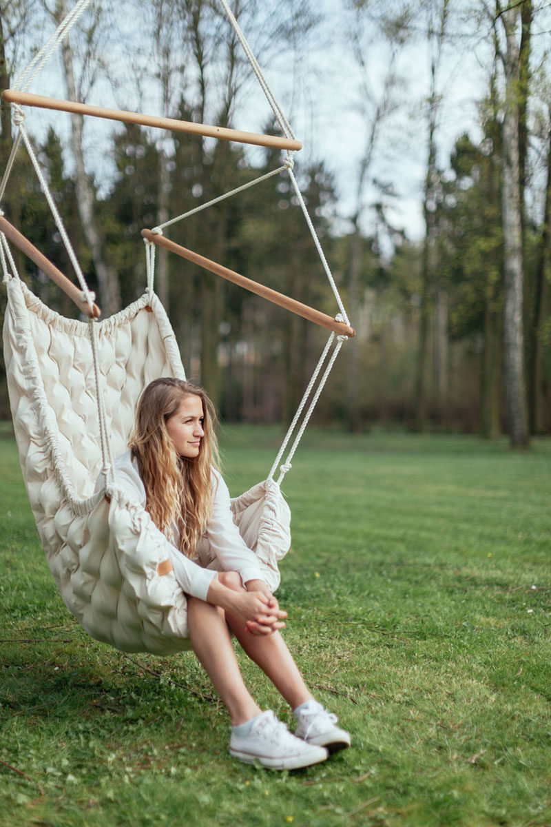 12 Outdoor Furniture Designs That Add A Sculptural Element To Your Backyard // Made from certified massage balls and coated with a durable synthetic, water-repellent fabric, this outdoor chair is designed to help you truly relax as you gently sway back and forth.