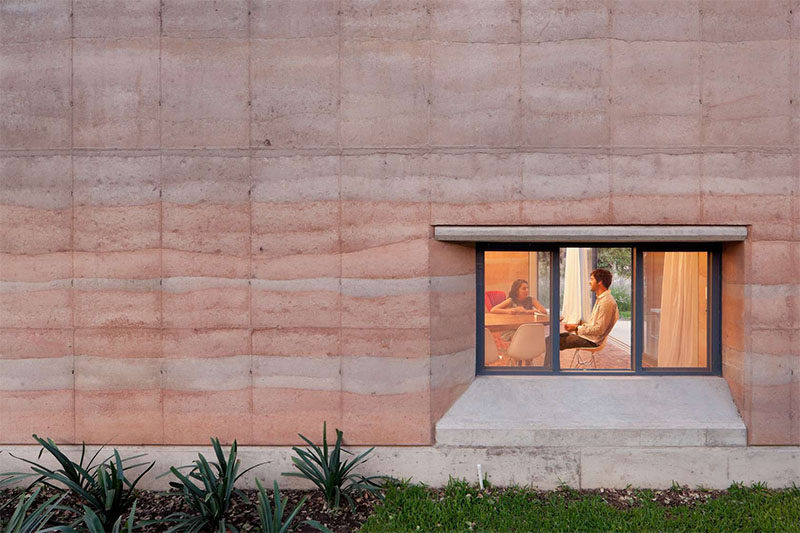 A modern house with rammed earth walls