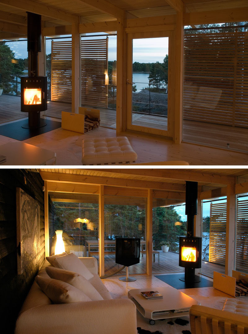 This cottage in Finland has sea views from the living room. A fireplace is included in the living room to keep warm in the winter months.