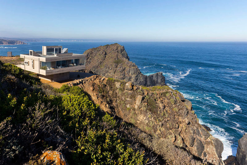 13 Totally Secluded Homes To Escape From The World // Perched above a steep cliff with views of the ocean, this secluded home is in Tunquén, Chile.