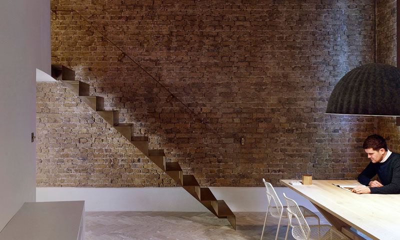 As part of the refurbishment of an apartment in Hackney, North London, Bell Phillips Architects designed minimalist stairs made from 6mm thick folded steel.