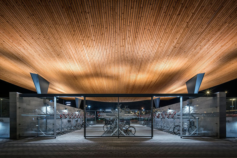 This Swedish train station entrance has a dedicated bike storage area as well as other facilities such as a pump, a repair station and lockers.