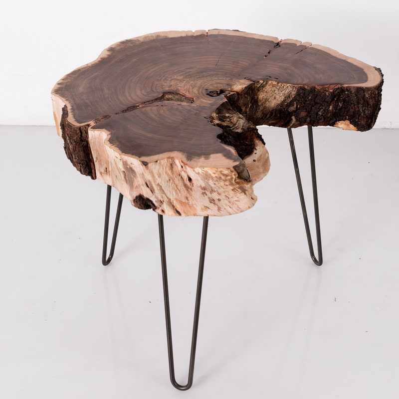 9 Ideas For Including Tree Stumps In Your Home Decor // Rescued stumps from Los Angles forests serve as the table top of these handmade stools and tables.