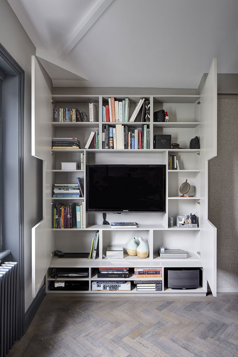 TV Wall Design Idea - Hide Shelves With Large Custom-Made Cabinet Doors