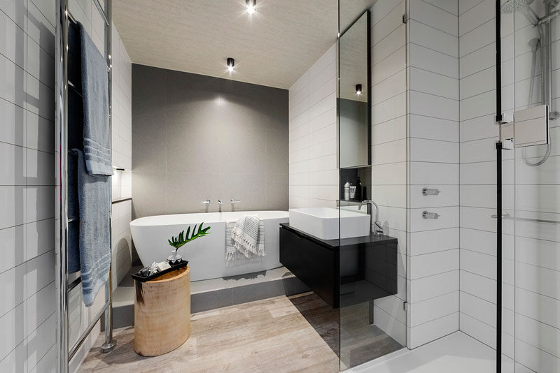 The bath in this bathroom is raised slightly to make the bathtub the focal point of the room.