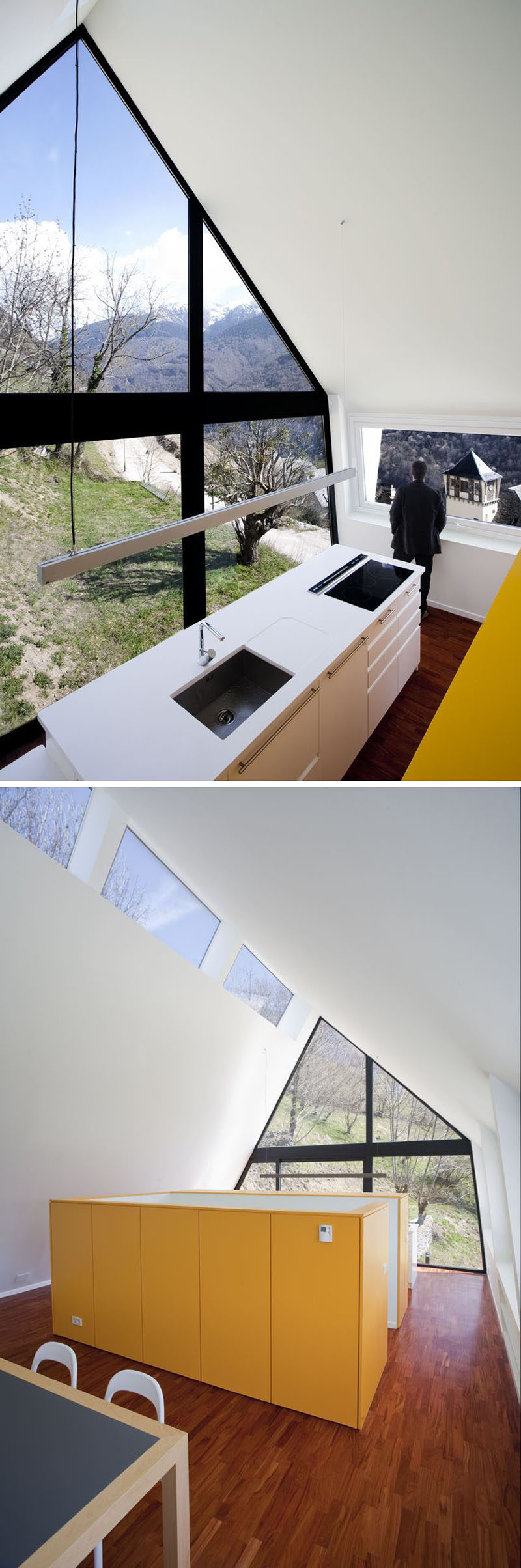 15 Awesome Examples Where Windows Follow The Roofline // The black frames of the this floor to ceiling window align with the edges of the roof and create a striking contrast with the white walls.