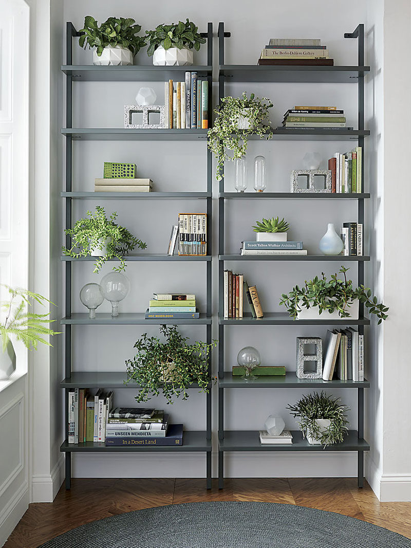 9 Ideas for Creating a Stylish Bookshelf // Greenery --- Plants literally give life to the shelves, and can be a great way to add height and depth to your display. Plus, they help purify the air, making them great for your home environment.