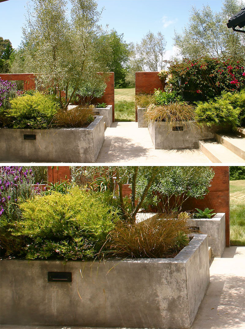 10 Inspirational Ideas For Including Custom Concrete Planters In Your Yard // Large concrete planters fill this back patio and create lots of space for plants without making it feel overrun or unmanageable.