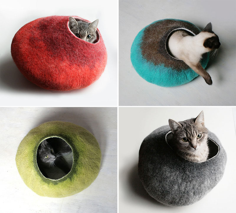 11 Cat Caves That Prove Cat Beds Can Be Stylish // These multi-toned felted cat beds have little openings that they can stick their heads out of and survey their surroundings from.