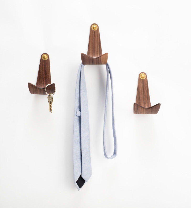 11 Creative Coat Hooks To Keep Your Clothes And Bags Off The Floor // These hooks have two narrow points at the end allowing them to hold small things, like key rings, but are curved enough to hold larger things like jackets, bags, or hats. #CoatHooks #WallHook #ModernWallHook