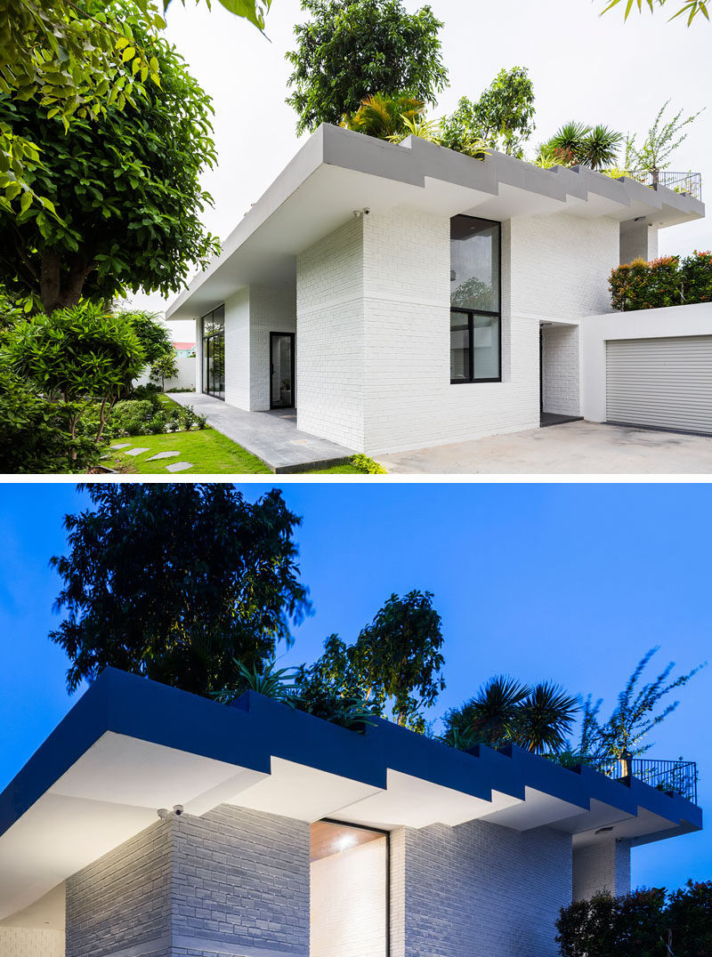 This home, located in Nha Trang, Vietnam, and designed by Vo Trong Nghia Architects and ICADA, has a stepped roof, with various terraced spaces that has each step down filled with plants.