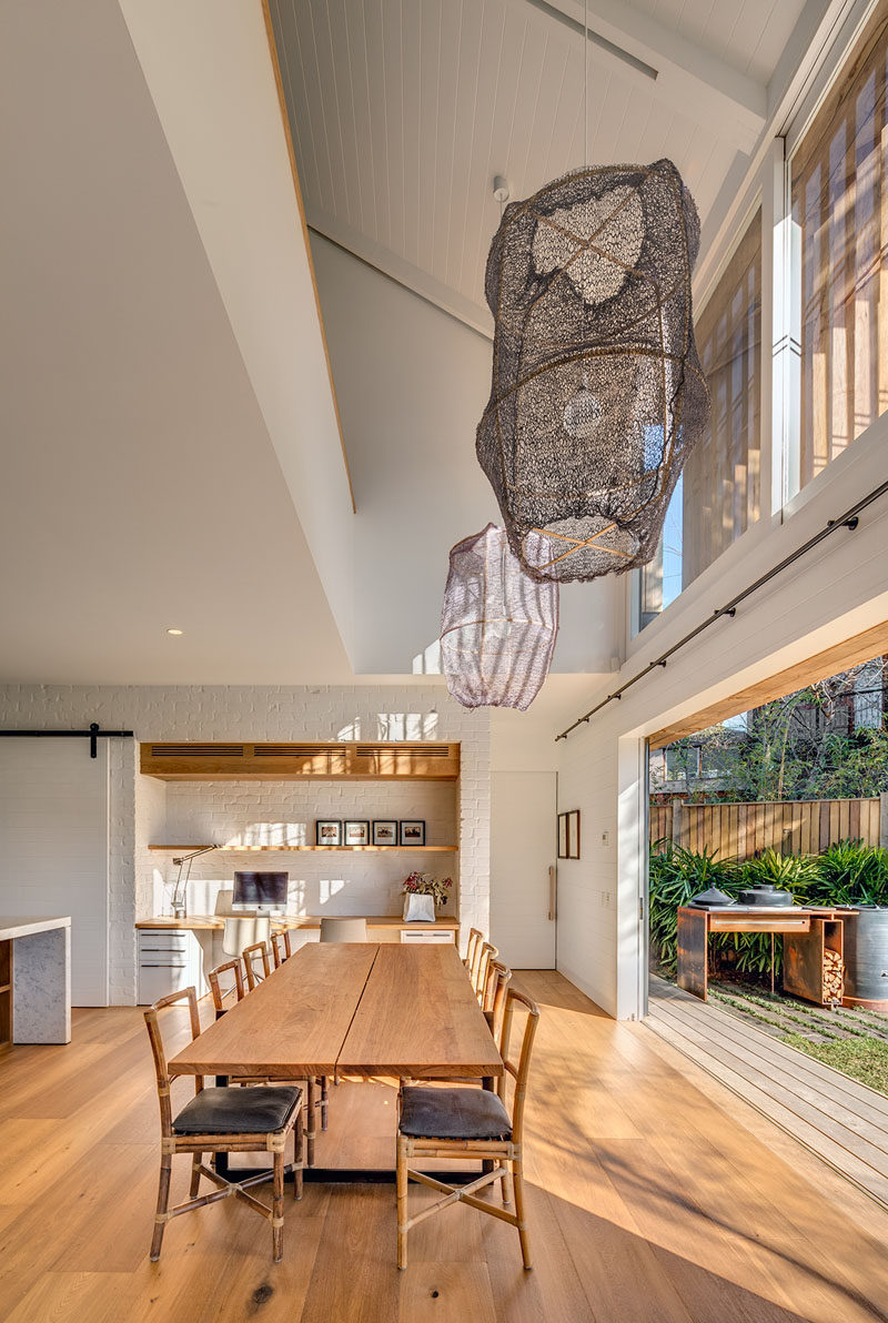 As with many Australian homes, indoor/outdoor living is often included in the design, and in this home they have achieved this by having a sliding doors next to the dining table that open directly to the backyard. There's also a BBQ area for cooking outside.
