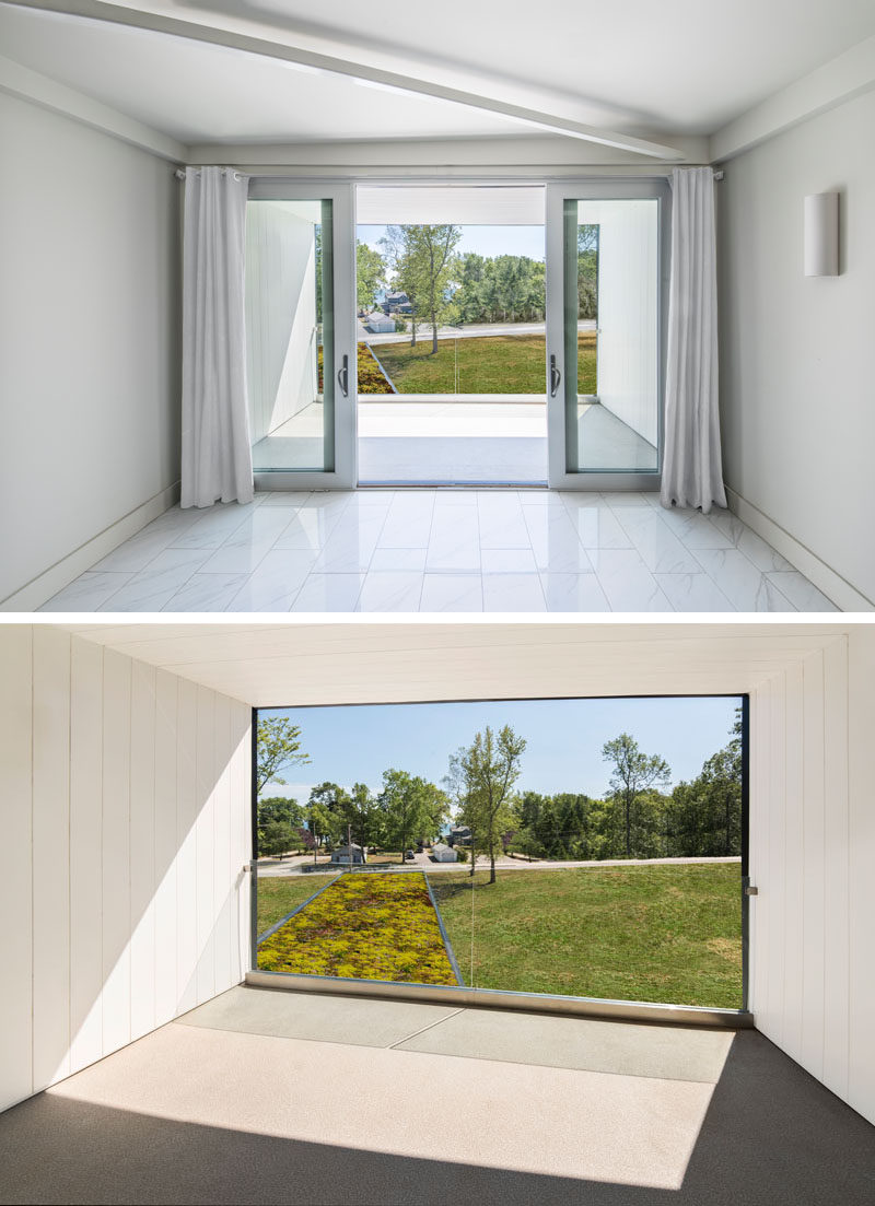 In this master bedroom tower, sliding doors open to a covered balcony, where views of the lake and the green roof below can be enjoyed.