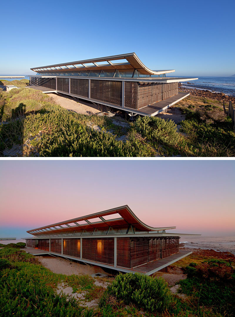 This home has been built using a minimal steel framed box with a hull-shaped roof, clad in hardwood.