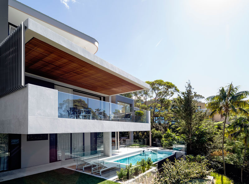 Set above a beach and adjacent to a nature reserve, is this three level home designed by Corben Architects.