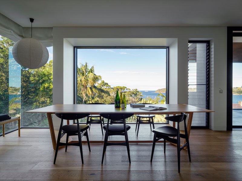 Back inside, the dining room has amazing water views from the large picture window.