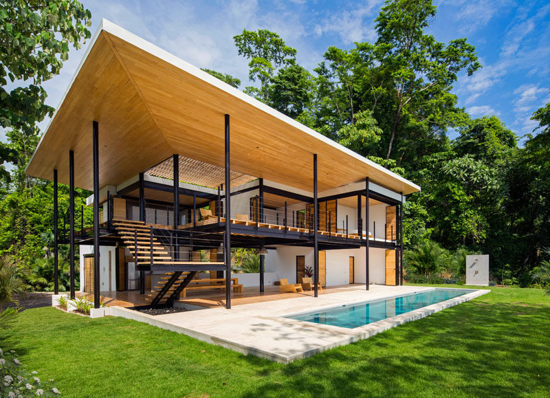 This recently completed home in Puntarenas, Costa Rica, is nestled between the jungle and the beach. Designed by Benjamin Garcia Saxe, the home is a series of interwoven terraces, creating multiple levels and opening the home to the outdoors.