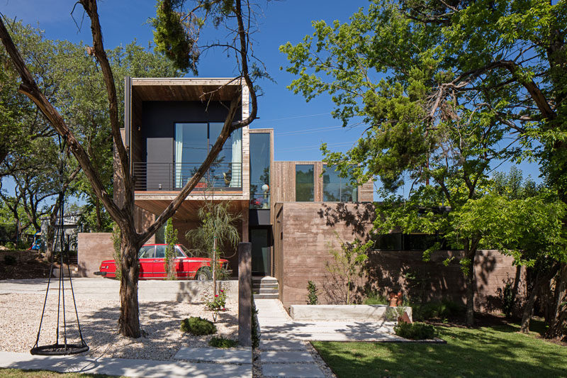 Bercy Chen Studio have designed a wood and concrete house in South Austin, Texas, that is centered around a small courtyard and pool.