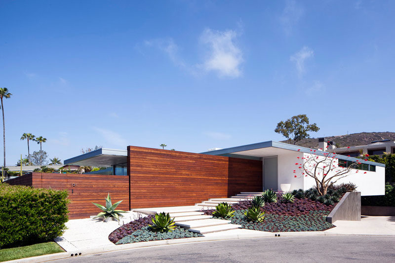 This Laguna Beach House has a landscaped front entrance, with great curb appeal and a path to guide you to the front door.